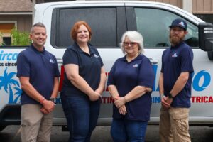 technician shaking hands with homeowners to begin hvac services in eureka springs ac